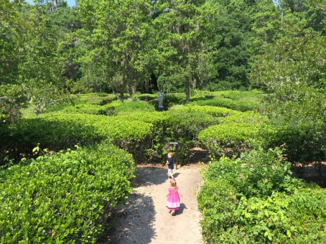 A & J entering the Magnolia Gardens hedge maze.